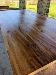 Peter did not use any epoxy to fill the knots and natural holes in the wood – he left them as is.