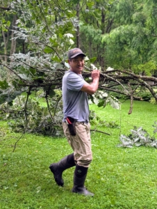 Here's Pasang carrying away more debris for chipping.
