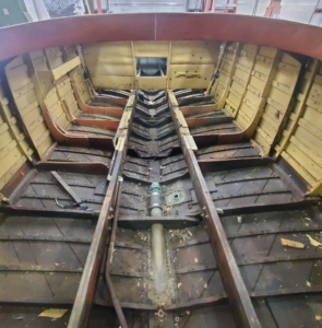 THRILL was stripped down to the bottom. All the interior fittings, decks, floors, trim, and other components were removed, leaving only the frame and old planking.