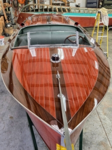 Once fully restored, THRILL was finished with multiple coats of hand-brushed varnish.