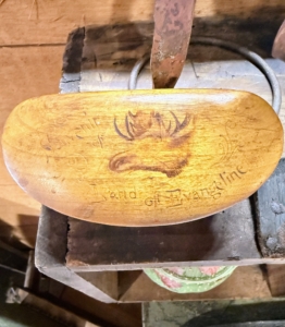 Handmade wood carvings are also often found in antique shops and galleries. This one reads "A Souvenir of the Land of Evangeline" which refers to the Henry Wadsworth Longfellow’s 1847 poem, Evangeline, A Tale of Acadie.