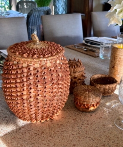 I surprised the group with some of my own baskets, which I displayed on the dining table as center pieces. The larger basket here is dyed to add a reddish tint. It also uses curls as decorations on the sides and top. It was made by Passamaquoddy Nation Elder, Diane Campbell.