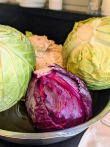 The right time to harvest cabbage depends on the variety of cabbage planted and when the heads mature. Look for heads that are firm all the way through when squeezed – that’s when they’re ready.