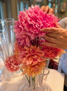 At the top, a giant dahlia. To prevent wilting, cut only in the early morning or late afternoon. And only cut them after they open to mature size – dahlias will not open after cutting.