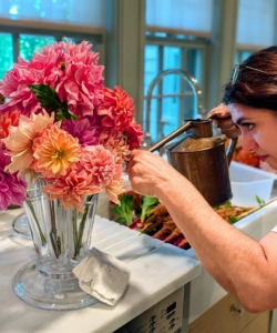 If needed, add more water. Invest in a good watering can for the flowers - one that allows for controlled use without damaging any of the fragile petals.