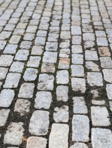 Pete put it to use right away. These cobblestones needed some regular cleaning to remove the dirt and grime that accumulates with use.