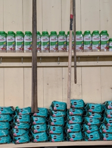 Along the wall on sturdy shelves are our Miracle-Gro fertilizers - also ready to grab when necessary.