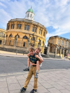 Here are Silas and Felix across from the Sheldonian Theater.