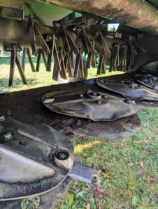 The discs and blades are located behind the machine's protective shield.
