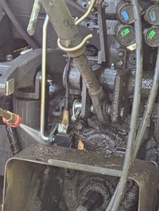 And then finally, he cleans around the mechanicals, but is careful to avoid any direct contact with bearings and seals.