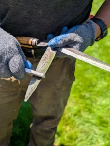He does the same to both sides of each blade.