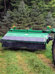 This is my mower-conditioner. It cuts, crimps, and crushes the hay to promote faster and more even drying.
