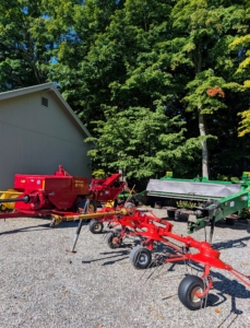 Once the equipment is cleaned and adequately sun dried, it is all pulled one by one behind the tractor to the barn specifically designated for these pieces.