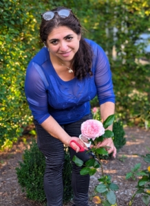 Enma cuts the flowers that are newly opened and fresh looking.