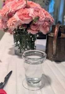 Arrangements don't always have to be big. A small glass container like this one will hold four to five stems beautifully.