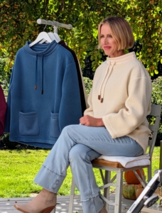Andrea joined me at the farm and showed off the Sherpa Pullover Fleece in white swan. It also comes in a darker demitasse. This piece has a stand collar, tunnel drawcord, and great, durable pockets.