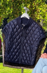 Everyone loves a good vest for fall and this is it - my Diamond Quilted Short-Sleeve Jacket with cap sleeves and a sweater knit ribbed trim. It has zippered fleece lined pockets and comes in this baritone blue, as well as caviar, dark olive, burro, and moon beam.