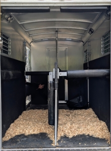 This is the back of my trailer. This trailer accommodates two horses and all the necessary horse tack and other supplies needed for travel. It is well-padded and very comfortable.