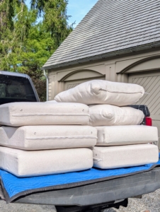 The crew began preparing early. All the cushions are removed from the poolside chaises longues and stored in my gym garage.