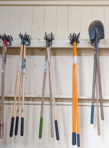 These are long handled cultivating forks which are bent at the end in order to turn the soil.