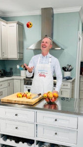 Here, Jake is preparing apples for a rustic homemade pie at a Martha Stewart Living rolling kitchen island. And look at his apron? It's Jake's "Martha Meets Betty" souvenir from when I visited General Mills in 2011.
