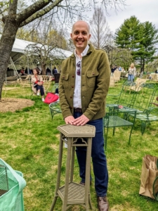Here is Andrew at my Great American Tag Sale in 2022. He's here with a plant stand he had just purchased. It once lived in my home in East Hampton, New York.