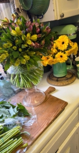 Here, Jeremy decorates his home with cut flowers.