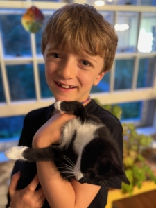 Here is Sophie's son, Felix, with "Poly," short for Polyhedron, or a figure with many faces.