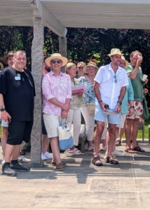 And here, the group was listening to me talk about the construction of my pool. Devotees came from all over for the special occasion - Wisconsin, Illinois, Massachusetts, California, Pennsylvania, Missouri, Maryland, Florida, West Virginia, Ohio, New Jersey, Michigan, Quebec, Ontario, Texas, Minnesota, Indiana, North Carolina, and of course, New York. And although the day was very warm and humid with temperatures in the high 80s, it was a wonderful time for all.