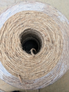 We also use jute twine. It is all natural and the same color as the burlap.