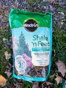 I use Miracle-Gro Shake’n Feed Flowering Trees & Shrubs plant food which has done so well for my plants. It contains natural ingredients such as kelp, earthworm castings, bone meal, and feather meal, which will feed the tree and maintain its foliage.
