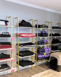 And this area has a collection of cold-weather vests and coats for big and small dogs.