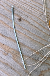To complete all the burlap projects, the tools are simple – we use five-inch long craft needles specifically made for working with jute. These needles have large eyes and bent tips. Every member of my outdoor grounds crew has a needle.