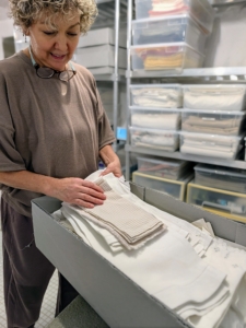 Inside, Patricia organizes linens in preparation for all my fall entertaining. Doing this now will save lots of time later.
