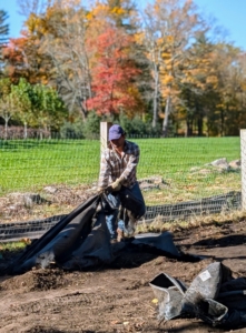 Jimmy works in this enclosed plant nursery where I keep potted young trees before they are planted in more permanent locations. It will be cleaned up and prepared for the storage of more saplings.