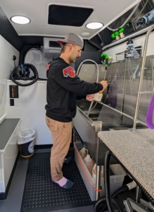 Here, Jonathan prepares for his first customer.