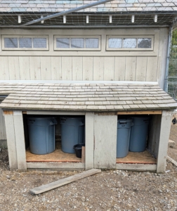 This small shed needed proper doors to keep the bins inside well protected.